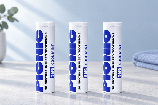 Picnic Cool Mint nicotine toothpick tubes in 3mg, 6mg and 9mg standing in a row on a counter